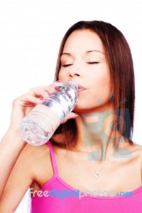 woman-drinking-water-from-bottle-100112627